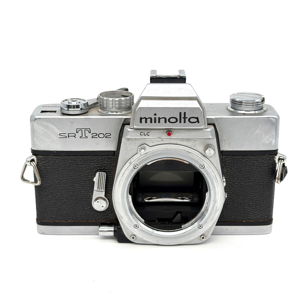 Minolta SRT 202 35mm SLR Film Camera Body Silver Black Vintage 2396308
